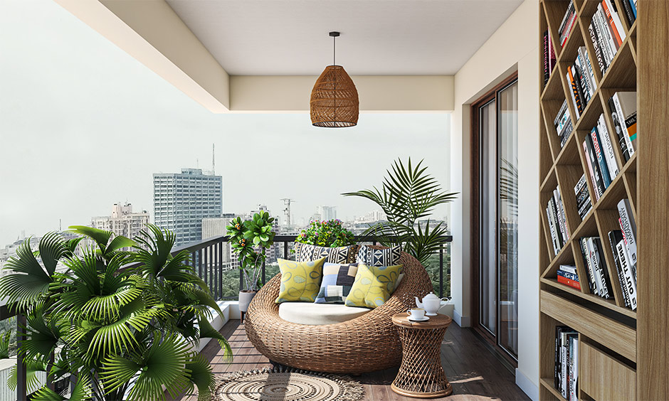 Cool outdoor furniture idea, A large single-seater rattan sofa on the balcony is stylish.