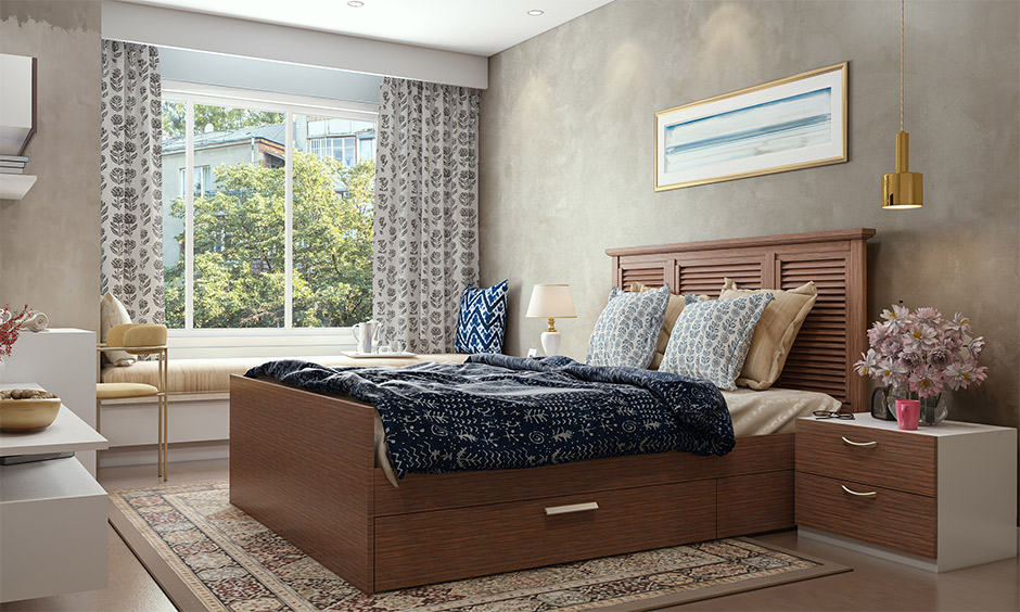 The modern bedroom has an Indian traditional room decor with block-printed bedspreads and pillow covers