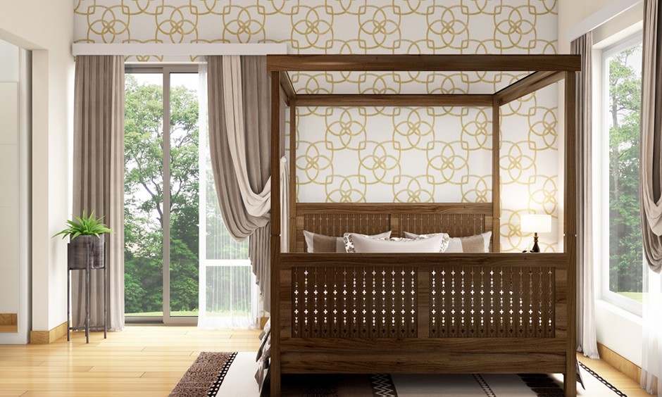 Wood canopy bed with a traditional pattern design and modern fabric giving an elegant look