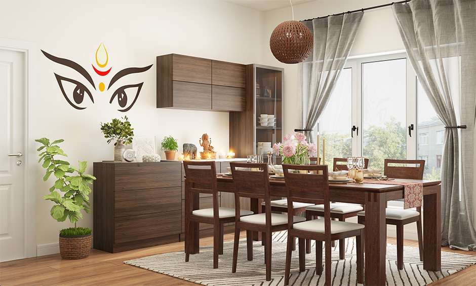 Durga puja decoration at home, dining room decorated with Durga eye wallpaper adds a contemporary feel