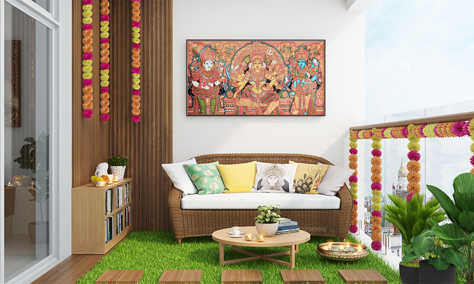 Durga puja decoration ideas for balcony wall decorate with an intricate Durga mural and flowers