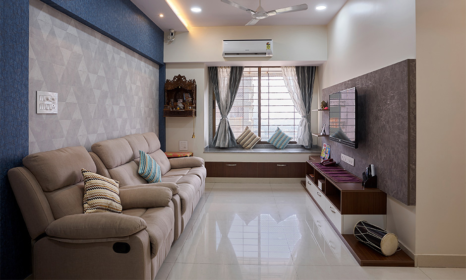 Make a small living room look bigger with tv unit and multipurpose furniture