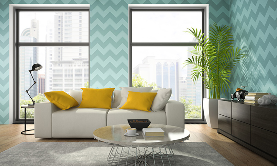 Refresing navy blue and yellow decor idea for living room with light blue wallpaper for the living room