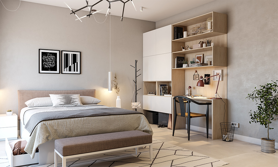 Cozy apartment bedroom idea with a wall shelving area in the study corner blend seamlessly