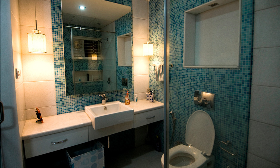 Create an accent wall with blue bathroom wall tiles