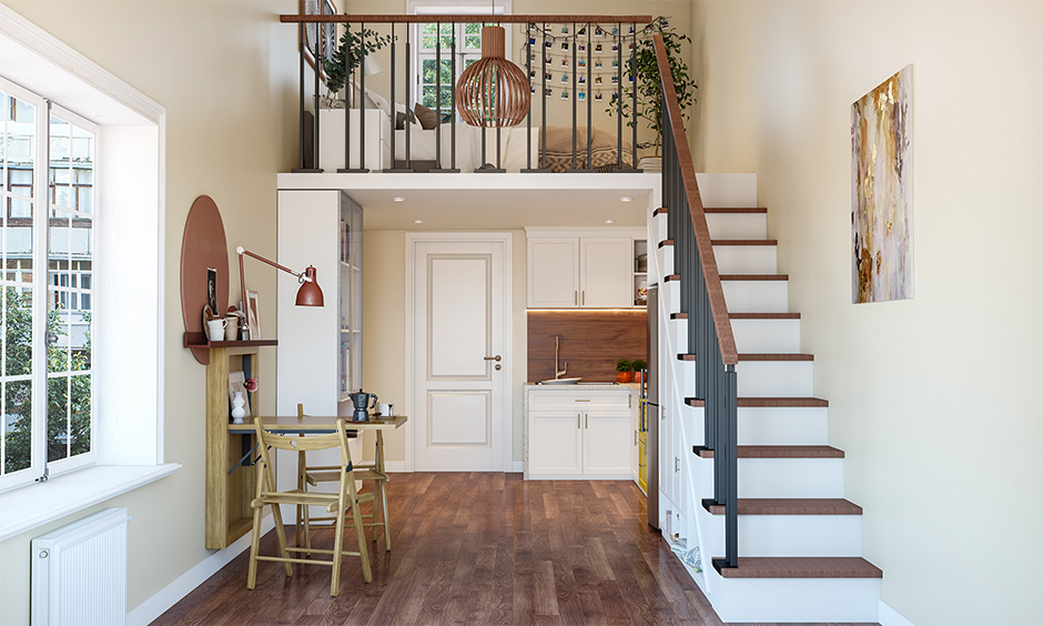 Cozy loft apartment bed and storage under the staircase in white theme makes the area look breezy and light