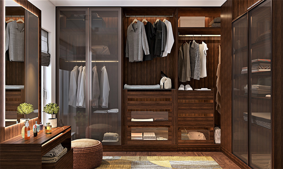 A walk-in wardrobe is a different type of wardrobe design with a mix of open and closed cabinets