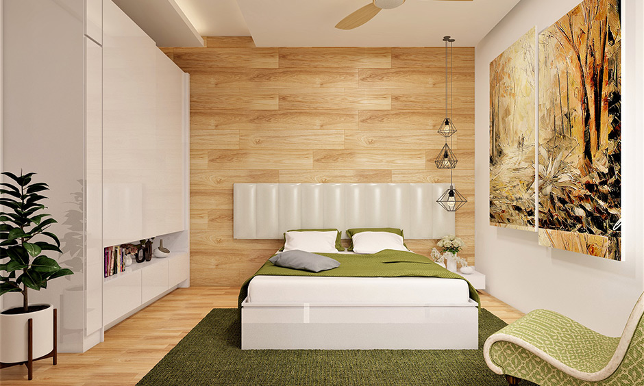 Elegant neutral bedroom in white colour with wooden accent wall and flooring mimics nature's elements