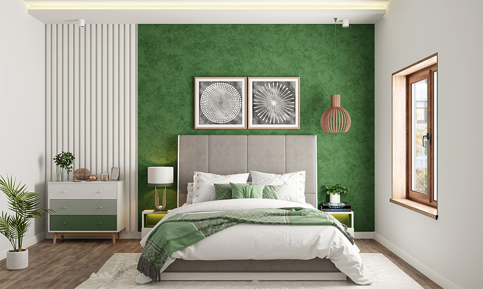 Contemporary bedroom with green accent wall and matching elements brings a tropical vibe