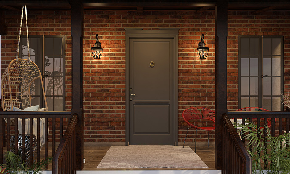 Home outdoor wall lights are best in pairs and lend an old-school look with a brick wall backdrop