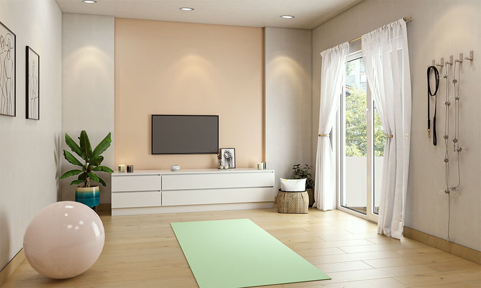 Home yoga room designed in a neutral colour creates a relaxing mood and the best yoga room designs