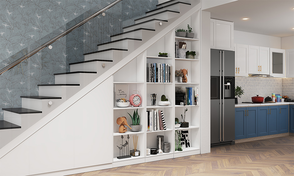 Inbuilt open bookshelf under stairs creates a space-saving design without hindering any floor area