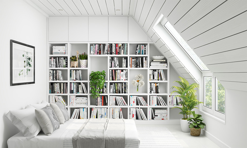 Reading room interior design of the attic with a bookshelf and bed transforms into a creative reading room