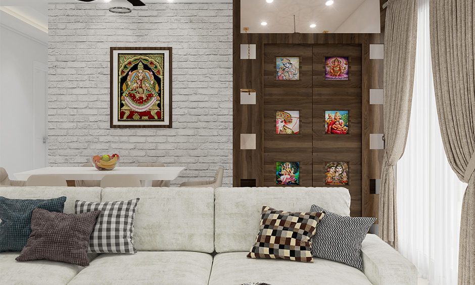 Religious images in the plywood door design for pooja room