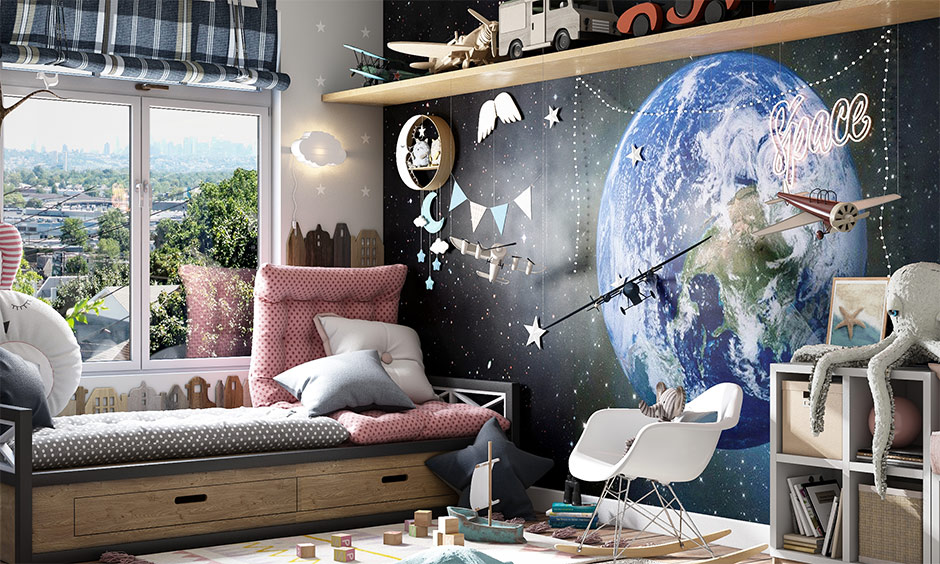 Space theme decoration for your kid's room with space-themed wallpaper, playful toys and simple decor elements