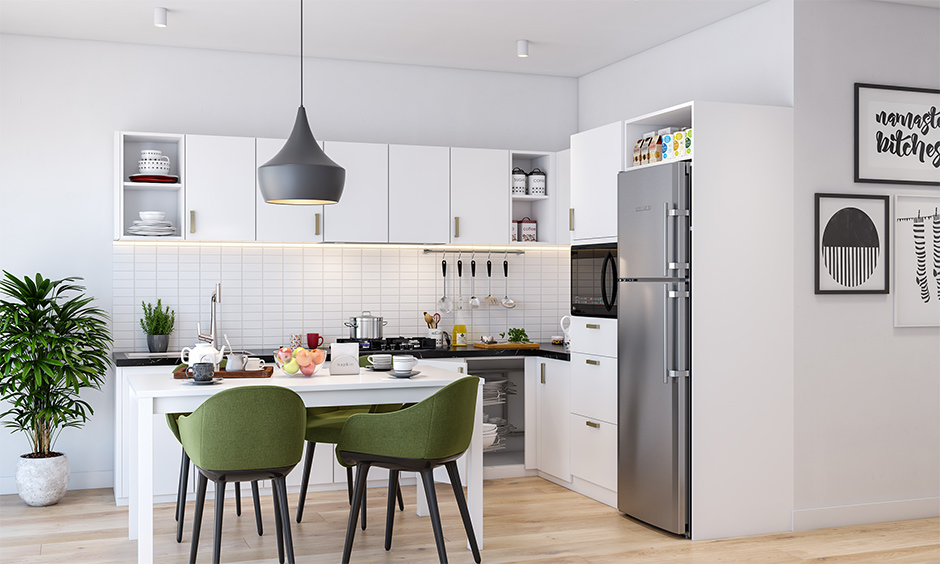 L-shaped kitchen loft design in white colour makes the place look spacious and bigger