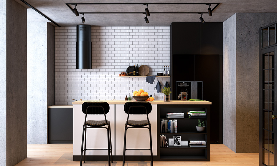 A modern kitchen island cum breakfast counter with bookshelf