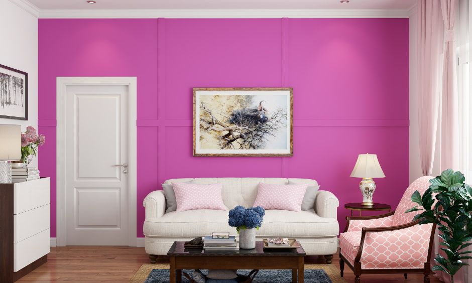 Bright color for living room walls with neutral-coloured sofa adds the perfect dash of colour