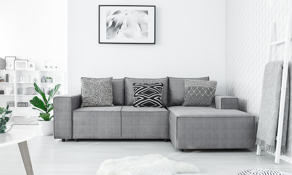 Create a calming contrast in a dark grey and white living room