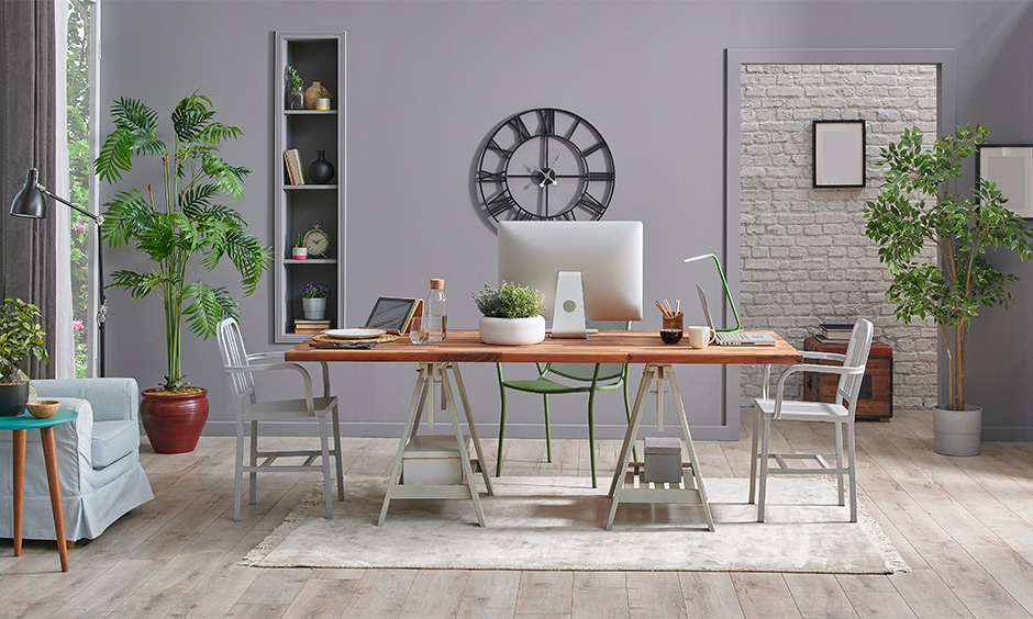 Home office decor with a trendy wall clock to keep track of time