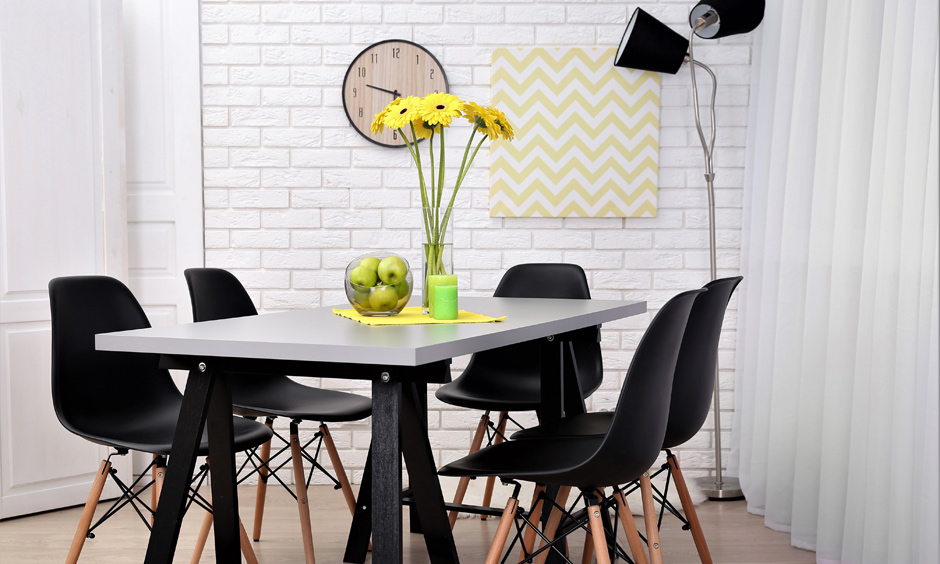 Black and white dining table with chairs in minimalist design