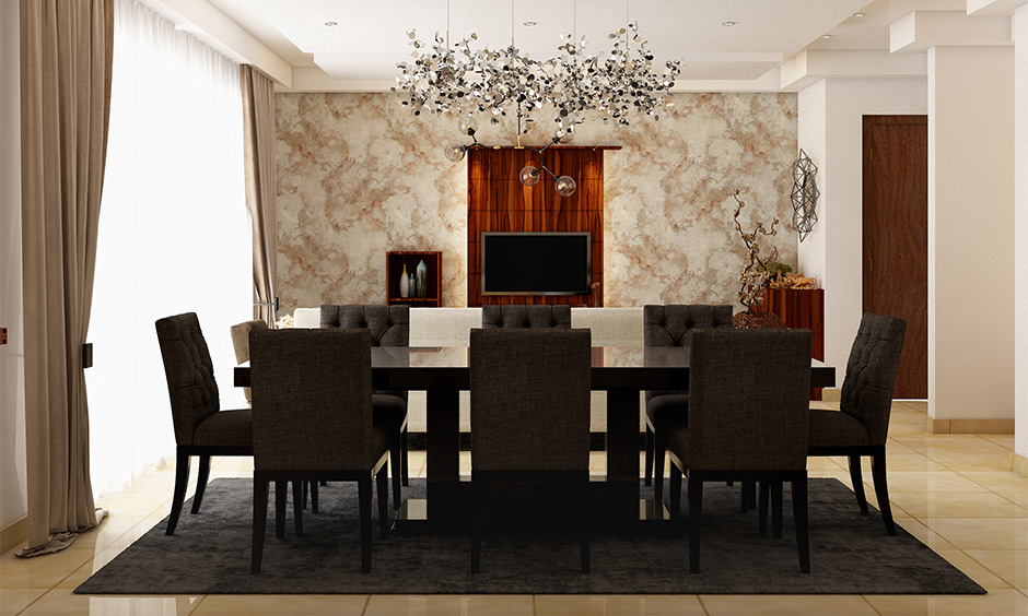 Pitch black dining room set adds the right amount of drama without overwhelming the space