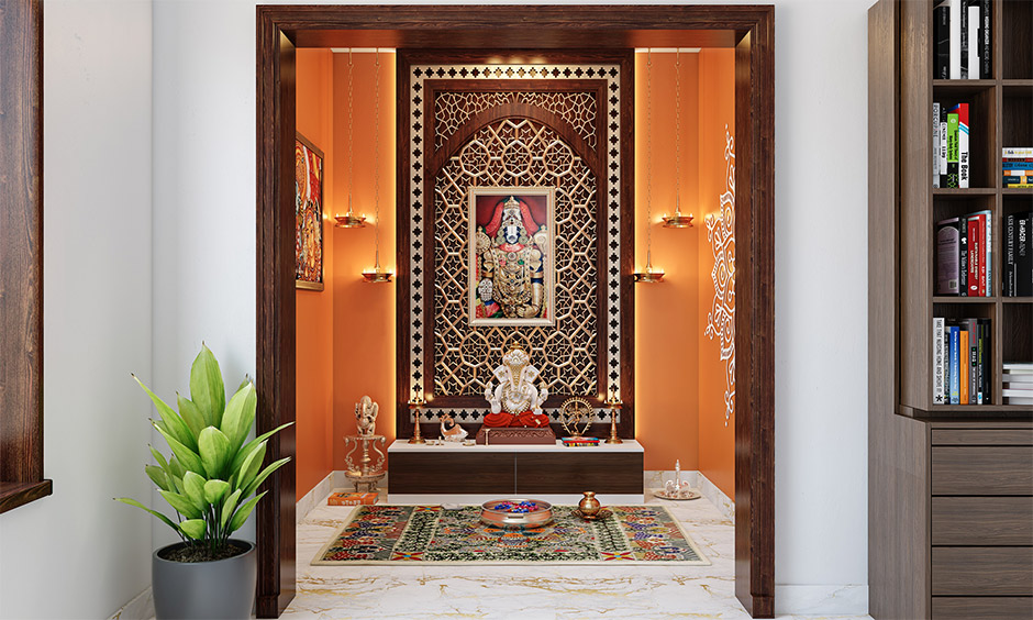 South Indian modern pooja room design with jaali wood carvings brings a traditional vibe