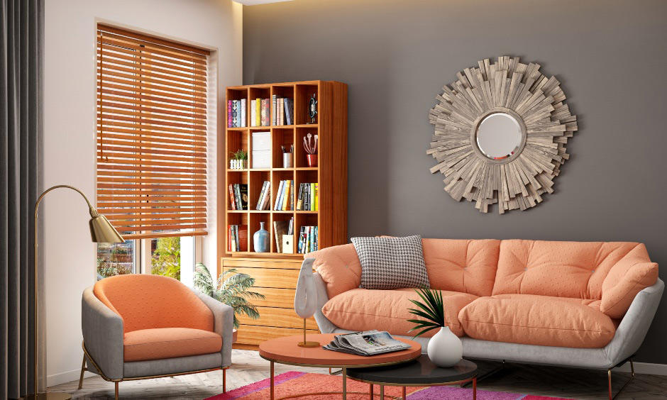 Bright living room colors with orange and grey make a charming combination