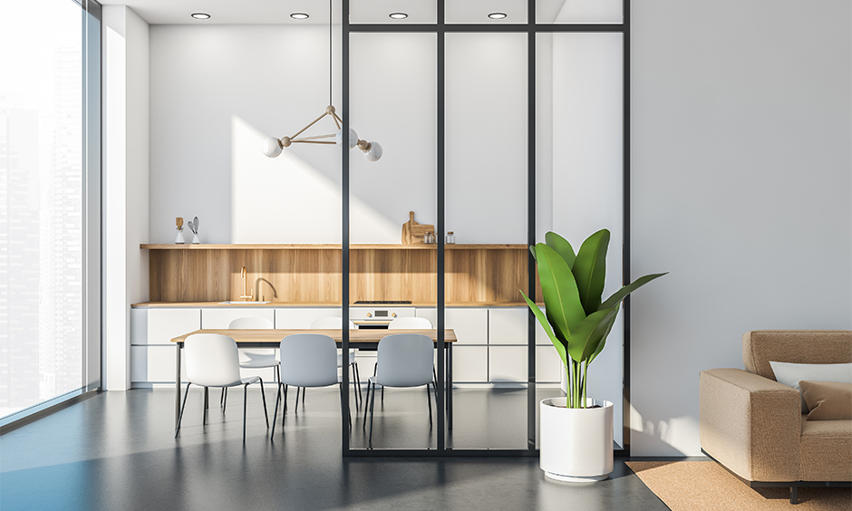 Minimal kitchen partition glass design with black iron framing is simple yet luxe