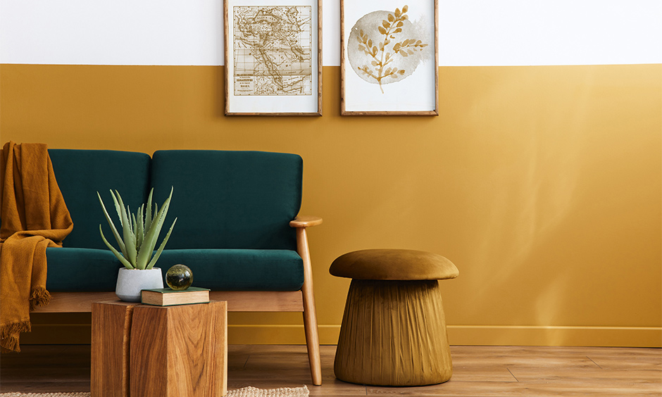 Pairing a dusty color combination with light yellow wall with emerald gives it a royal spin