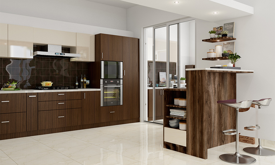 Sliding glass partition design for an Indian kitchen is timeless and easy to manage