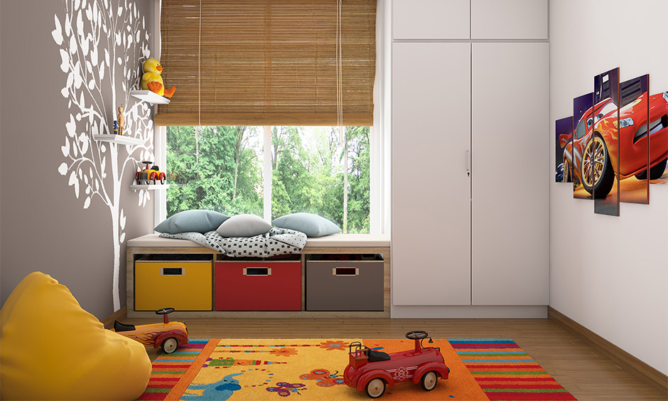 Kids' bedroom with a white almirah design-laminate finished and made from plywood