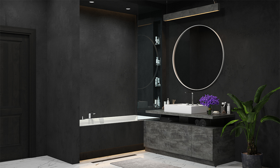 Bathroom design with a matte black wall paint colour gives it a luxe makeover