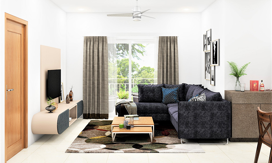 A dark grey couch in the living room looks sophisticated and stylish