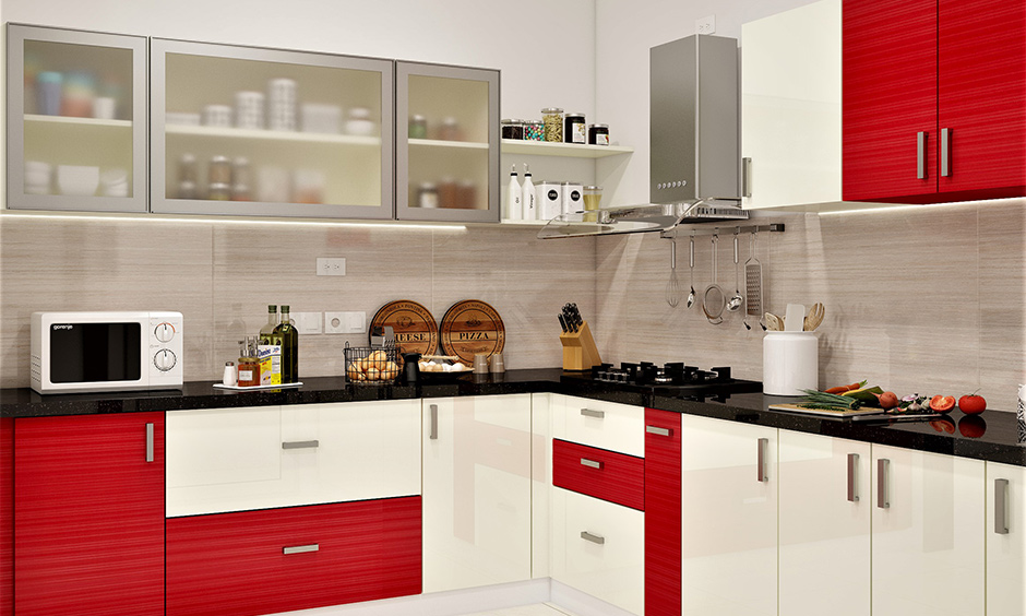 Light coloured kitchen cabinets with pops of red lend depth and attractiveness