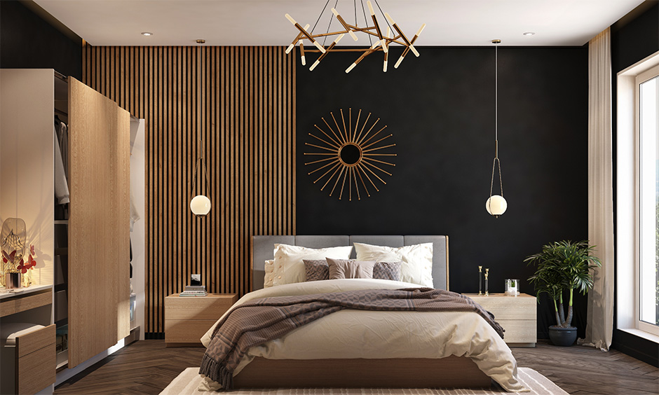 Matte black bedroom wall paint with woodwork break the monotony