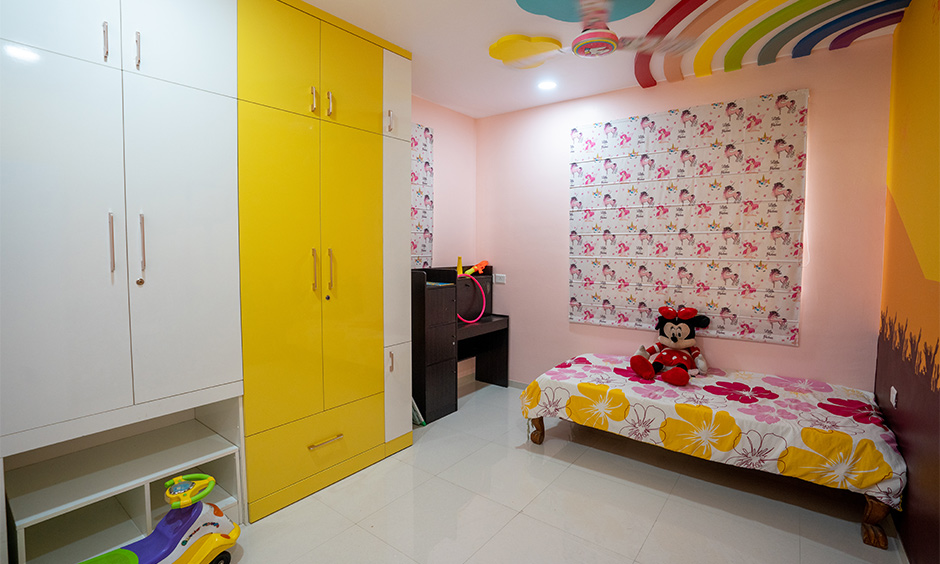 A bright, colourful and spacious bedroom for kids by home interior designers in hyderabad