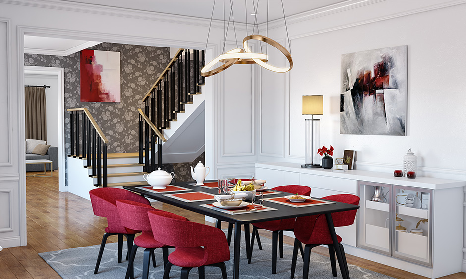 An elegant black and red contemporary dining table set with a smart play of colours