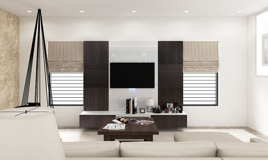 A black and white living room with dark furniture and accent colours will bestow such a gorgeous look