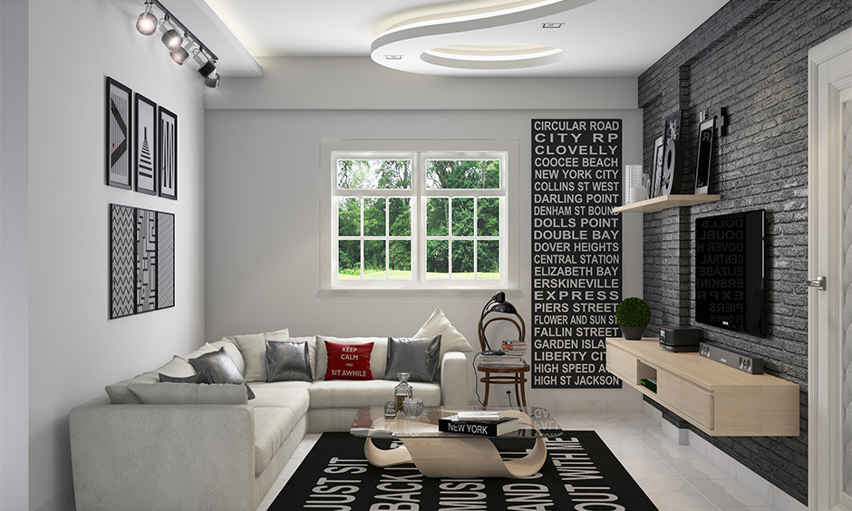 Bold black and white living room decor with type print rug and wall colour