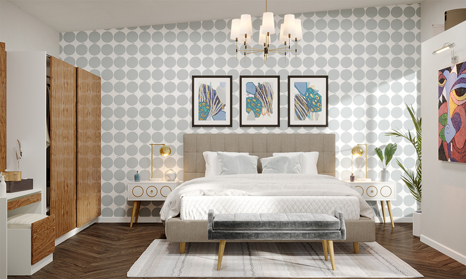 A mid-century modern bedroom design features an upholstered bed with classic angled legs