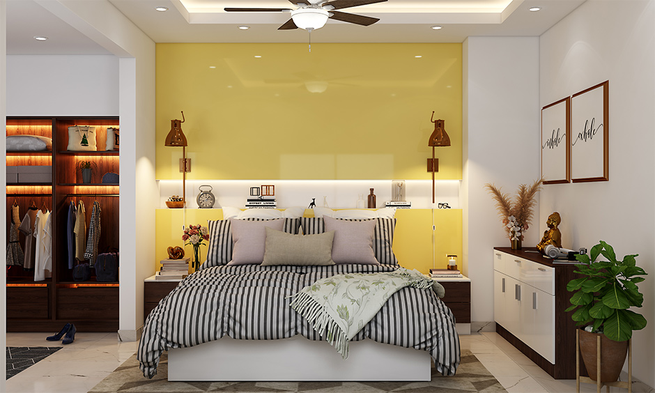 10 by 12 bedroom wall design with high glossy laminates add a spacious vibe