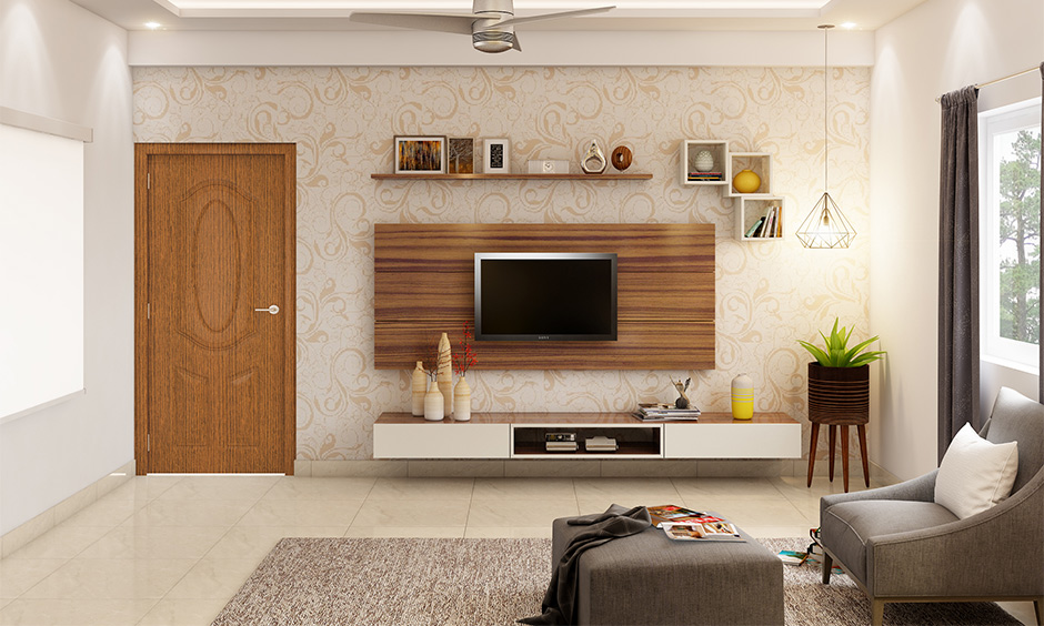 Indian contemporary home interiors for the living room designed in an earthy tone give a warm vibe