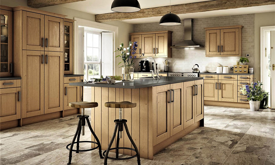 A kitchen island with swivel bar stools makes a bold statement and sits perfectly in the homely kitchen surroundings.