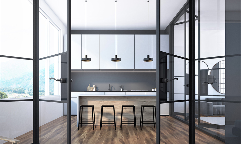 A kitchen counter with metal bar stools is easy to clean and lasts a lifetime.