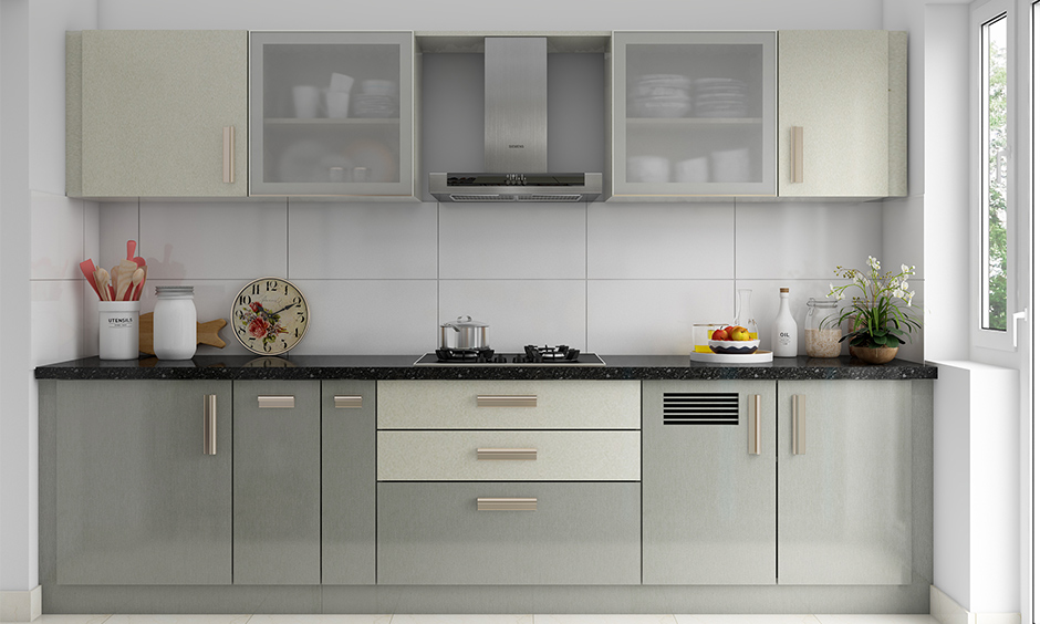 A minimalist kitchen with a contemporary home interior and displays metallic accents lend a futuristic appeal