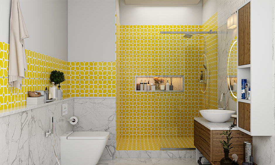 Patterned yellow tiles in the bathroom with marble let the tiles stand out