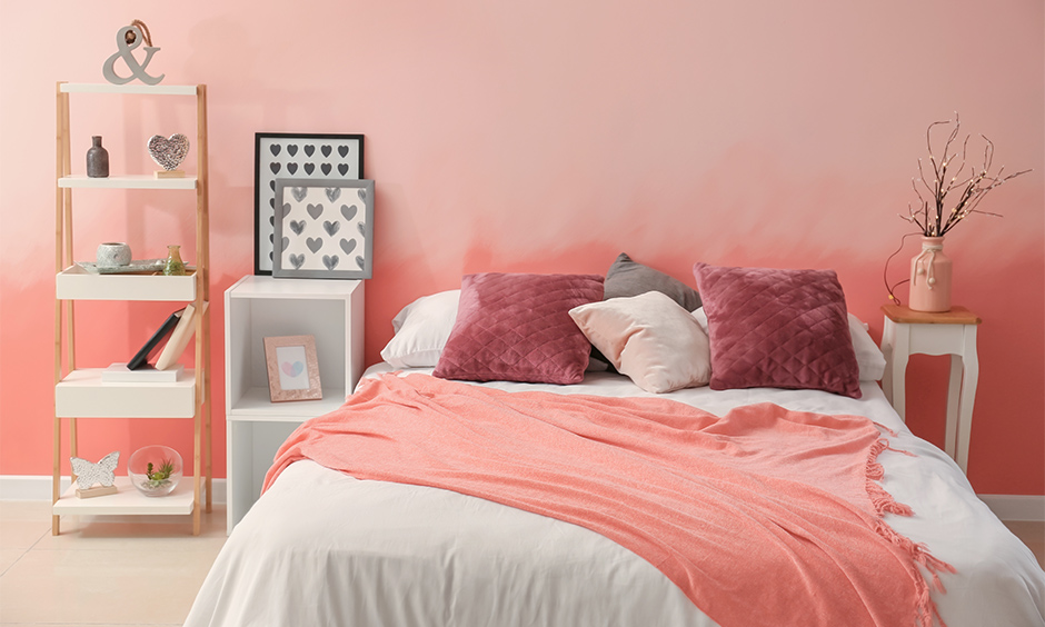 Pink bedroom design with a coral coat which fills your bedroom with a refreshing vibe