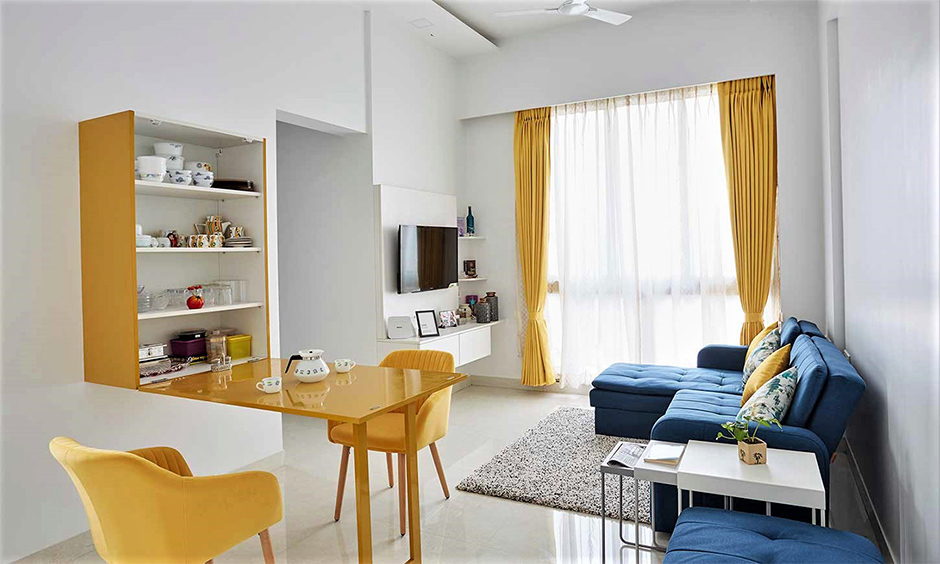 Small living room with a dining tables for small spaces that makes room for guests