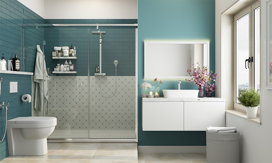 A teal bathroom wall mirror in a rectangle with a LED backlight is stunning